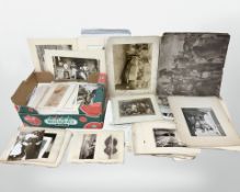 An assortment of unframed pictures and prints, monochrome photographs, sketches,