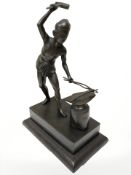 A contemporary oriental bronze statue on wooden plinth of a blacksmith, height 21 cm.