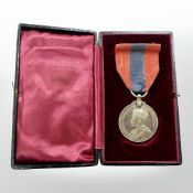 A George V Imperial Service Medal named to Walter Holmes, in case of issue.