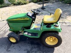 A John Deere GT245 garden tractor, 20 HP V-Twin engine, 574.8 hours, with user manual, two keys.
