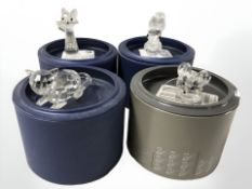 Four Swarovski crystal animal figures to include : Two cats, squirrel and mouse, all boxed.