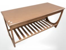 A G Plan painted teak two tier coffee table, length 110 cm.