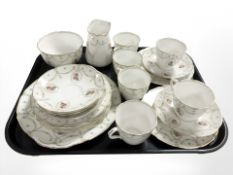 A Royal Doulton twenty one piece tea service.