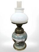 An oriental porcelain vase converted to an oil lamp, height 56 cm.