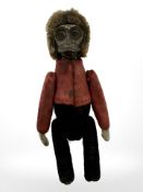 A 1920's Schuco monkey perfume bottle,