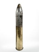 A British WWI 18lb round with fused brass head