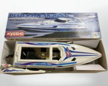A Kyosho Models blue streak 800 radio controlled racing boat, in box.