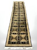 An Eastern style runner 370 cm x 92 cm