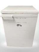 A Meile under bench fridge