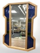 An oak and stained glass framed mirror, 75 cm x 55 cm.