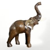 A Liberty & Co leather elephant figure,
