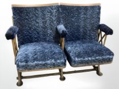 A pair of mid 20th century metal framed cinema seats, width 110 cm.