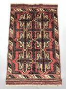 A Balouch rug, 136 cm x 87 cm.