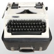 A German Erika typewriter in travel case