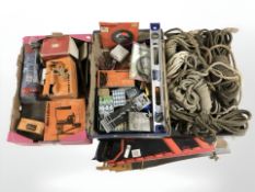 A quantity of boxed tools, Black and Decker, several hand saws, lengths of rope, spirit level,