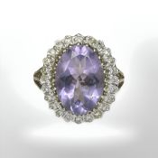 A 9ct gold amethyst and diamond cluster ring,
