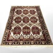 A Persian style rug,