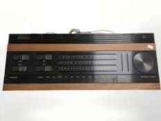 A Bang and Olufsen Beomaster 2000, with lead.