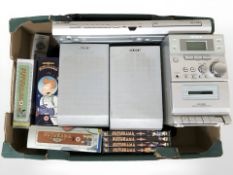 A Sony Micro hi-fi system, Samsung DVD player and a quantity of Futurama DVDs.
