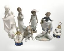A group of figurines including Nao, Royal Doulton,