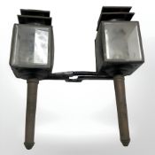 A pair of antique painted metal carriage lamps,