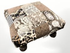 A contemporary footstool