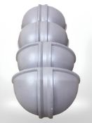 A set of four painted cast metal wall planters, width 30 cm.