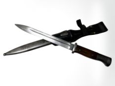 A German WWII K98 Mauser bayonet, 25cm blade stamped 42cof (1942 date code Carl Eickhorn),