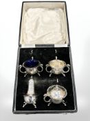 A silver four-piece cruet set, Atkin Brothers, Sheffield 1948, boxed.
