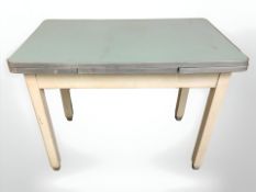 A mid 20th century melamine topped pullout extending kitchen table, 100 cm x 60 cm x 76 cm.