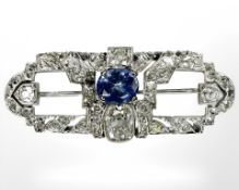 A fine platinum sapphire and diamond brooch,
