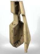 An early 20th century painted wooden cello case with brass bow handles, height 130 cm.