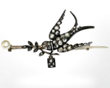 A fine antique diamond, ruby and pearl swallow brooch,
