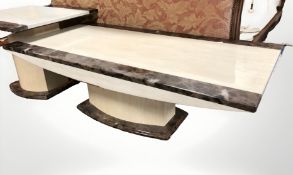 A contemporary marble effect rectangular pedestal coffee table, length 120 cm,