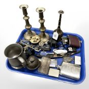 An interesting collection of collectables : cigarette lighters, belt buckle, hip flasks,