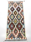 A Chobi Kilim, 152 cm x 65 cm.