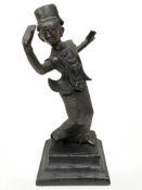 A contemporary oriental bronze statue on wooden plinth of a dancing figure, height 18 cm.