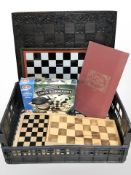 A group of chessboards, boxed chess and draughts set, etc.