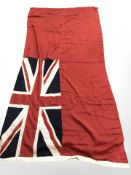 A large British naval flag, approximately 270 cm x 130 cm.