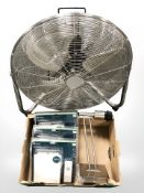 A fan, three battery wall mounted doorbells and a lamp.