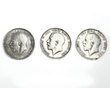 Three George V half crowns, two 1915 examples and another dated to 1919.