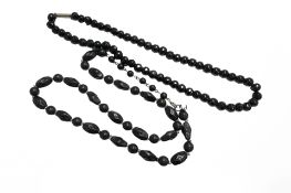 Two Whitby jet necklaces.