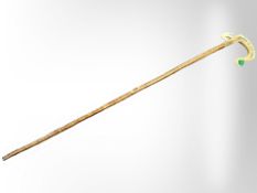 A horn-handled shepherd's crook with the Cusack name in Gaelic, length 134 cm.