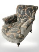 A Victorian library armchair in the Howard style