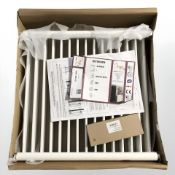 A 600 mm x 600 mm white radiator