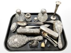 A group of silver-backed dressing table items, silver-topped jars, bud vase (loaded), thimble,