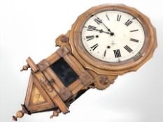A Victorian walnut drop dial wall clock, length 85 cm.
