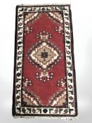 An Iranian wool rug,