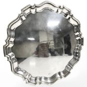 An EPNS scalloped edge presentation salver, with inscription 'To Flying Officer and Mrs.