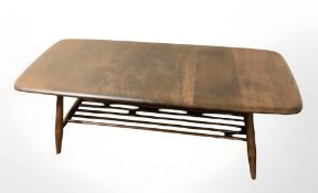 An Ercol stained elm coffee table, 106 cm long.